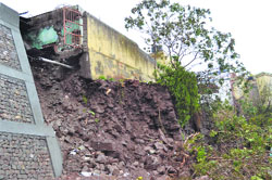 The damaged portion of courts complex following heavy rain in Rajouri. Photo by writer 
