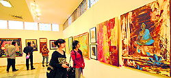 Visitors at the on going exhibition at Punjab Kala Bhawan
