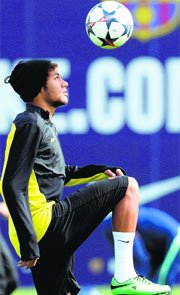 Neymar takes part in a training session on the eve of Barcelonas Champions League quarterfinal second leg against Manchester City.