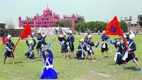 Students display gatka during the Hola Mohalla celebrations at International Fateh Academy in Amritsar on Wednesday