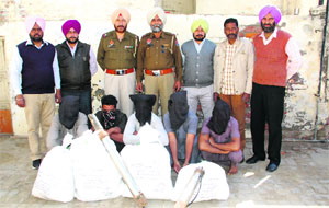 The five thieves with the stolen copper in police custody in Bathinda on Wednesday