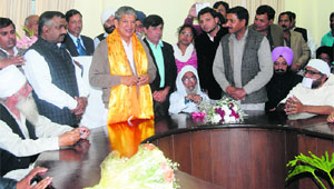 Chief Minister Harish Rawat meets representatives of different religious communities in Dehradun on Wednesday.