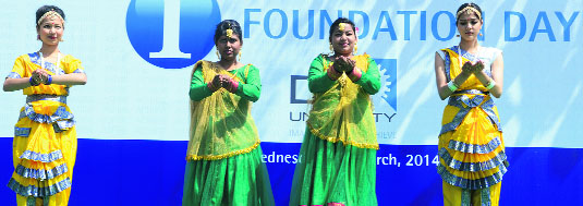 Students perform at the foundation day celebrations of DIT University in Dehradun on Wednesday.