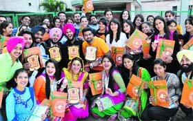 Students of Apeejay College of Fine Arts in a jubilant mood during the annual prize distribution function in Jalandhar on Wednesday