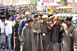 Stranded passengers at the Jammu bus stand demand arrangements for their stay till the Srinagar national highway reopens