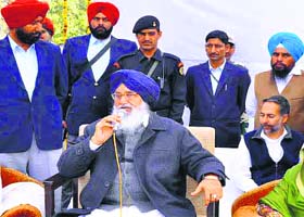 Chief Minister Parkash Singh Badal campaigns for his daughter-in-law Harsimrat Kaur at a Muktsar village on Wednesday