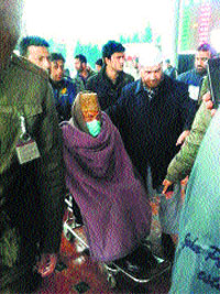 Hurriyat chief Syed Ali Shah Geelani at the Srinagar airport .