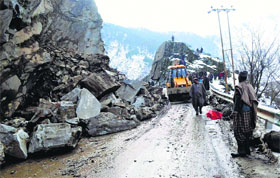 Rubble being cleared from the Srinagar-Muzaffarabad road on Thursday after a landslide.