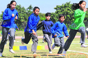 Students of First Step Montessori School in action during an athletics meet in Panchkula on Friday. 