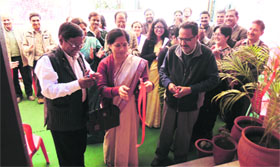 Indu Singh, principal of MKP Girls College, inaugurates a library of Mahila Samakhaya in Dehradun on Friday.