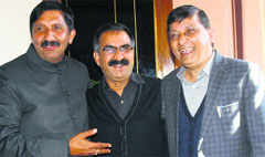Rajinder Rana, former MLA (extreme right), with Sukhwinder Sukhu, HPCC chief, and Mukesh Agnihotri, Parliamentary Affairs Minister, in Shimla on Friday. Photo: Amit Kanwar