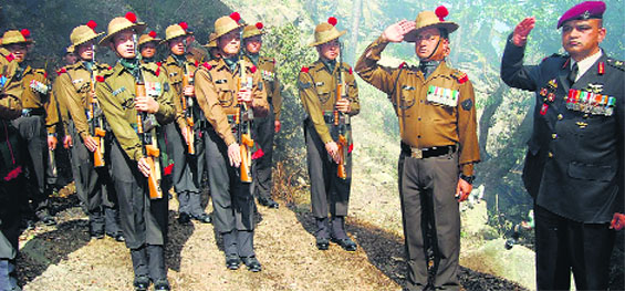 Jawans of the Assam Rifles give a salute to slain colleague Santosh Kumar at Badehad village on Friday. Photo: Jai Kumar