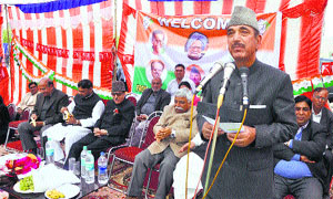 Union Health Minister Ghulam Nabi Azad addresses an election rally in Rajouri district on Friday.