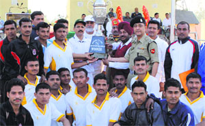Winning BSF jawans at the athletics meet in Jalandhar on Friday