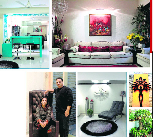 (Clockwise from above) Bar in the basement; Play of green and colour contrasts in the living room; A huge life-size sculpture adorns the sunken court in the basement; Green touch in the balcony; Modernistic look for the lounge area; and The proud homeowners  Vijay Kulkarni and Anjali Tiwari Kulkarni. 
