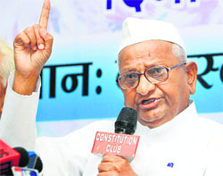Social activist Anna Hazare addresses mediapersons during a function in New Delhi on Friday.