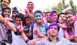 Students play Holi in Amraitsar on Saturday