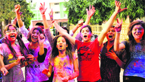 Students of DAV College, Sector 10, Chandigarh, celebrate Holi on Saturday. 