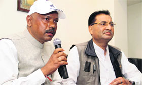 Suspended BSP MLAs Surendra Rakesh and Haridas address medapersons in Dehradun on Saturday.