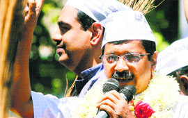 AAP chief Arvind Kejriwal with V Balakrishna, party candidate for Bangalore Central (L), in Bangalore on Saturday.