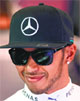 Mercedes driver Lewis Hamilton strikes a pose before the start of the qualifying session of the Formula One Australian Grand Prix in Melbourne.  AFP