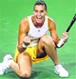 Flavia Pennetta celebrates after beating Li Na in the semifinals of the BNP Paribas Open at Indian Wells on Friday. AFP