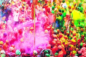 Revellers gather during Huranga at the Dauji temple near Mathura