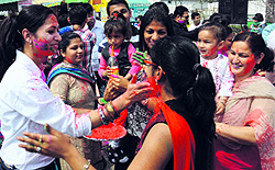 Teachers and parents celebrate Holi at Bachpan Play School on Sunday