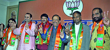 BJP Lok Sabha candidates from Delhi (R to L): Ramesh Bidhuri from South Delhi, Udit Raj from Northwest Delhi, Harsh Vardhan from Chandni Chowk, Manoj Tiwari from Northeast Delhi, Mahesh Giri from East Delhi and Meenakshi Lekhi from New Delhi during a press conference in New Delhi on Sunday.