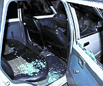 A car damaged during a clash between the supporters of Manpreet Singh Ayali and Simarjit Singh Bains