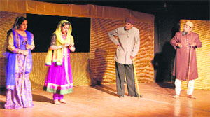 Artistes perform during the play, 'Miann Ki Jutti Mian Ke Sar', at Virsa Vihar in Amritsar on Tuesday. 