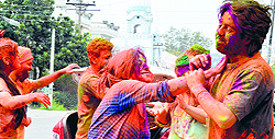 Youngsters have a gala time during Holi in Ludhiana on Monday