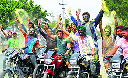 Youngsters have a gala time during Holi in Ludhiana on Monday