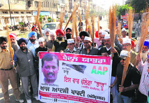 Relentless: Members of the Aam Aadmi Party take out an awareness rally to sensitise voters in Amritsar on Wednesday