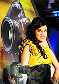 A model poses with Nikon Professional D4S camera at its launch in New Delhi on Wednesday