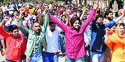 Students of Panjab University hold a protest march on the campus on Wednesday