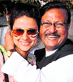 AAP nominee Gul Panag is greeted by BJP leader Satya Pal Jain