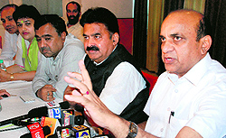 Congress candidate Raj Kumar Valmiki addresses mediapersons in Panchkula on Wednesday