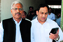Ashok Sherwal, state general secretary of the INLD, comes out after inaugurating a party office in Sector 10, Panchkula, on Wednesday