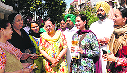 Family members of Ravneet Singh Bittu during a door-to-door campaign in Mohali on Wednesday