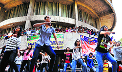Students perform a flash mob at Panjab University on Wednesday