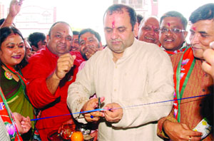 Mahesh Giri, the East Delhi candidate for BJP, inaugurates the party office to start the Lok Sabha election campaign on Wednesday