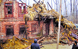 A residential house that got damaged at Botango village of south Kashmirs Anantnag district, on Wednesday