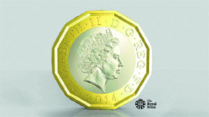 After 30 years of work, the one-pound coin is ready for a makeover. This handout photo issued by HM Treasury shows the side of the new coin.