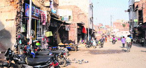 A view of an unpaved road in the Ghee Mandi area in Amritsar on Thursday. 