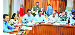 District Election Officer-cum-Deputy Commissioner KK Yadav holds a meeting with representatives of various political parties in Bathinda on Thursday. a Tribune photograph