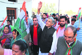 Congress candidate Pawan Kumar Bansal at Dhanas village on Thursday.