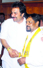 Kuldeep Bishnoi with Sushil Indora in Hisar on Thursday.