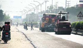 The dilapidated Tanda Road being recarpeted ahead of the Lok Sabha polls in Jalandhar on Thursday