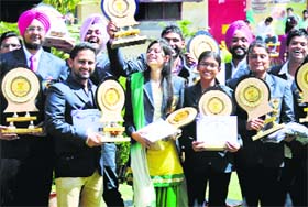 Students, who were awarded roll of honour and college colours at the annual prize distribution function of Arya College in Ludhiana